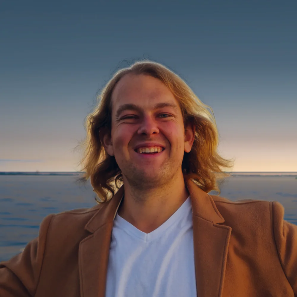 Portrait of Arnold Krenzler — AZADA — by the sea at sunset